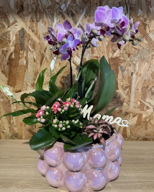 Centro MAMA con phalaenopsis rosa y plantas